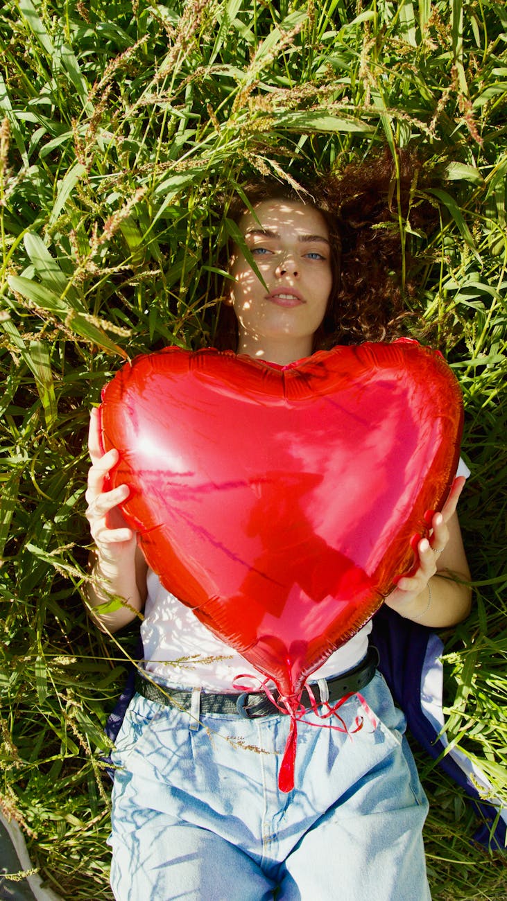 a woman lying on the grass